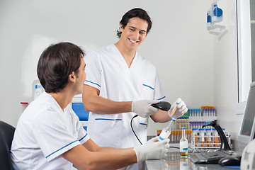 Image showing Technicians Scanning Barcode On Samples