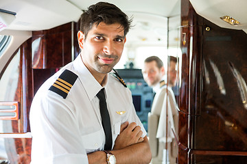 Image showing Confident Pilot In Private Jet