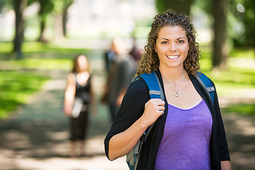 Image showing Happy Female Student Standing At Campus