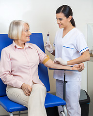 Image showing Businesswoman Undergoing Blood Test