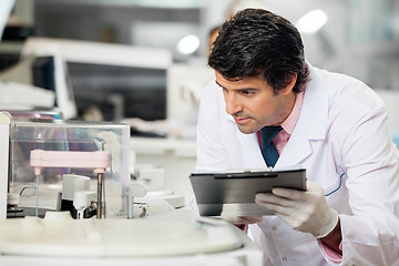 Image showing Scientist Observing Experiment