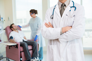 Image showing Doctor Standing Arms Crossed In Chemo Room