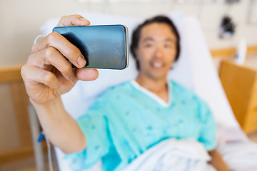 Image showing Patient Taking Self Portrait Through Mobile Phone In Hospital