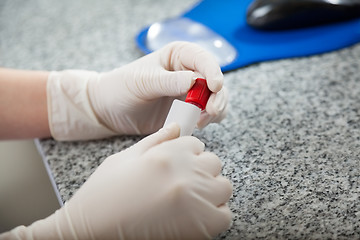 Image showing Technician Labeling Test Tube In Lab