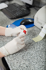 Image showing Technician Labeling Test Tube In Lab