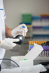 Image showing Technician Scanning Barcode On Medical Sample