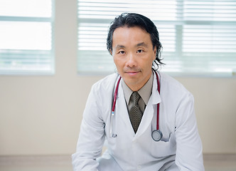 Image showing Confident Doctor Sitting In Hospital Room