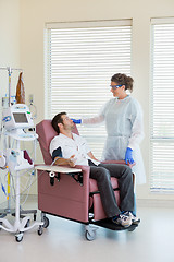 Image showing Nurse and Chemo Patient Visiting