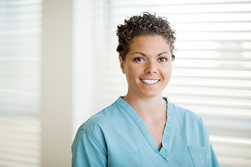 Image showing Happy Female Nurse In Scrubs