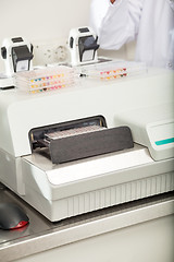 Image showing Microplates On Analyzer In Lab