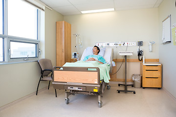 Image showing Male Patient Lying On Bed In Hospital