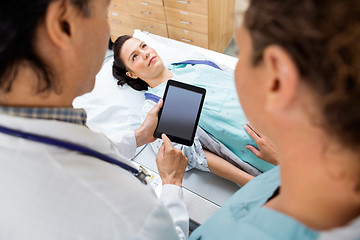 Image showing Medical Team With Patient In Hospital Room