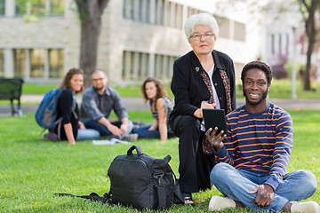 Image showing Professor Helping Student on Digital Tablet