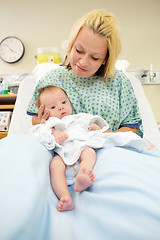 Image showing Newborn Baby Girl With Mother In Hospital