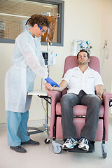 Image showing Nurse Injecting Cancer Patient During Intravenous Treatment In H