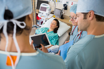 Image showing Nurses and Patient in Post Op Unit in Hospital