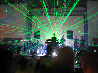 Image showing DJ in a view of the green laser
