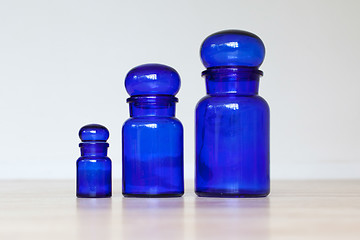 Image showing Blue glass jars