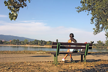 Image showing Girl on bench