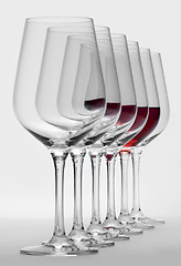 Image showing wine glasses in a row