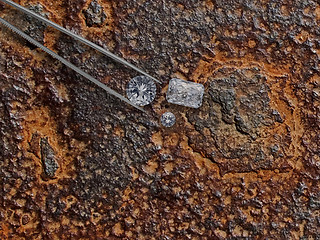 Image showing diamonds over rusty plate