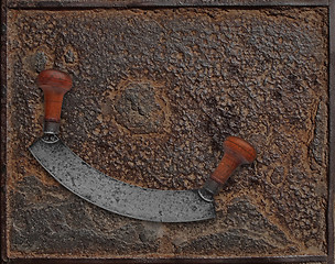 Image showing vintage chopper over rusty plate