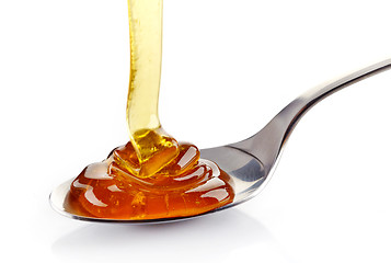 Image showing pouring honey