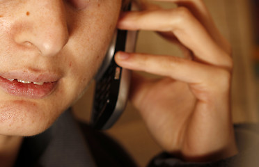 Image showing Woman speaking on cellphone