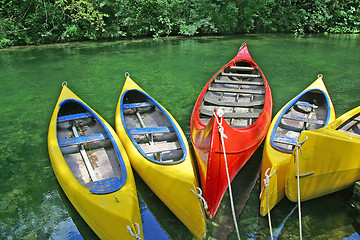 Image showing plastic canoes