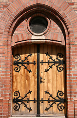 Image showing Wooden door with steel fitting