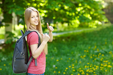 Image showing Smiling woman student with backpack