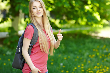 Image showing Smiling woman student with backpack