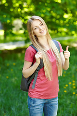 Image showing Smiling woman student with backpack