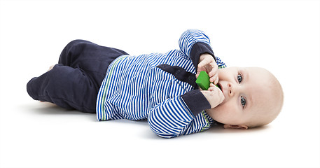 Image showing toddler with toy on floor