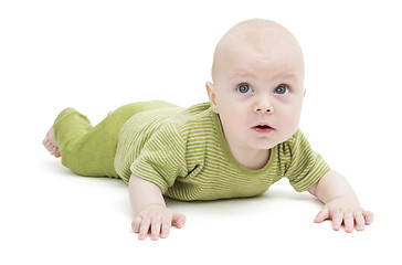 Image showing toddler in green clothing isolated in white background