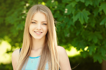 Image showing Pretty young woman outdoors.