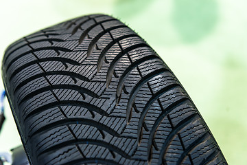 Image showing New car tyre closeup photo