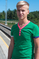 Image showing Stylish man with on platform