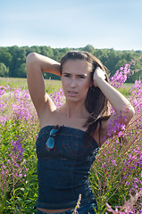 Image showing Beautiful brunette female in field