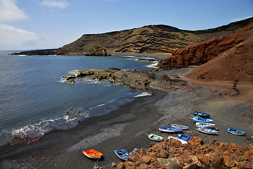 Image showing boats musk pond rock stone 