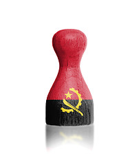 Image showing Wooden pawn with a painting of a flag