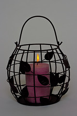 Image showing Wire basket candle.