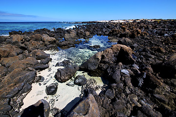 Image showing sky light  beach water  in lanzarote  isle foam rock spain lands