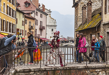 Image showing Disguised Person Posing on a Bridge