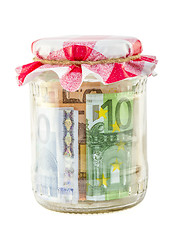 Image showing saving money in glass jar