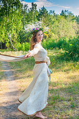 Image showing Beautiful woman with flower wreath