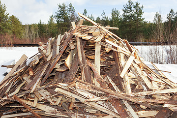 Image showing Pile of boards procured as firewood 