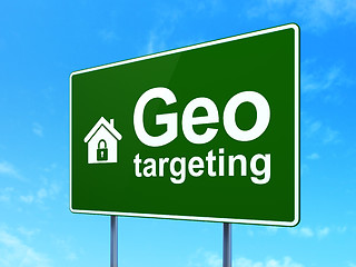 Image showing Finance concept: Geo Targeting and Home on road sign background