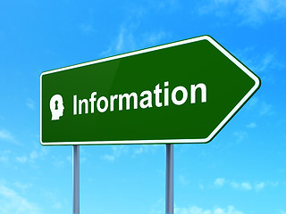 Image showing Data concept: Information and Head With Keyhole on road sign background