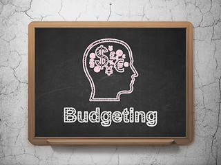 Image showing Finance concept: Head With Finance Symbol and Budgeting on chalkboard background